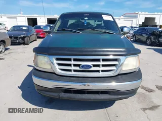 1999 Ford F-150 XL with VIN 2FTRX07W1XCA67223, listed as a IAAI auction lot 41661743 with 1 mi miles. Bid and sale history available at carsss.com. Image 12.