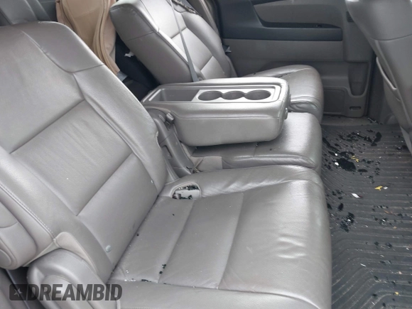 2014 Honda Odyssey Touring with VIN 5FNRL5H9XEB045695, listed as a IAAI auction lot 41545348 with 131,472 mi miles and . Bid and sale history available at carsss.com. Image 8.