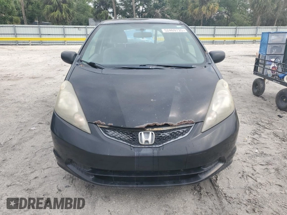 2009 Honda Fit with VIN JHMGE88249S068080, listed as a Copart auction lot 52469735 with 222,156 mi miles and Clean Title. Bid and sale history available at carsss.com. Image 5.