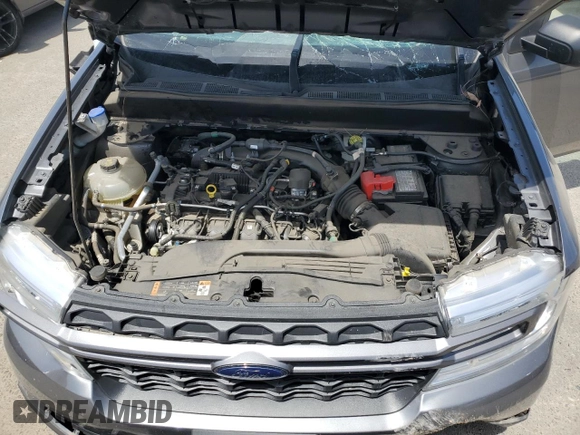 2022 Ford Maverick XL z VIN 3FTTW8E91NRB07146, wystawiony jako Copart lot #54366835 z przebiegiem 23 309 mil mil oraz Szkoda całkowita • Salvage title. Historia ofert i sprzedaży dostępna na DreamBid. Obrazek 11.