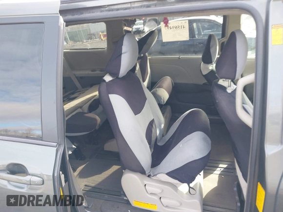 2013 Toyota Sienna LE AAS with VIN 5TDKK3DC9DS334815, listed as a IAAI auction lot 41589497 with 223,674 mi miles and . Bid and sale history available at DreamBid. Image 8.