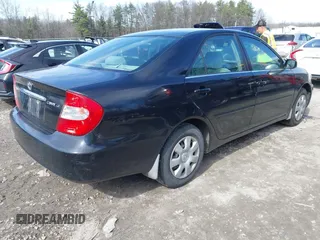 2004 Toyota Camry LE with VIN 4T1BE32K94U307994, listed as a IAAI auction lot 41847450 with 164,016 mi miles and . Bid and sale history available at carsss.com. Image 4.