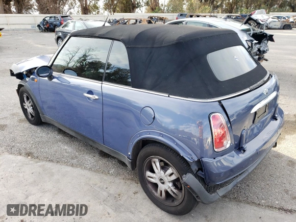 2007 MINI Convertible with VIN WMWRF33537TF66807, listed as a Copart auction lot 43664845 with 91,079 mi miles and Salvage Title. Bid and sale history available at DreamBid. Image 2.