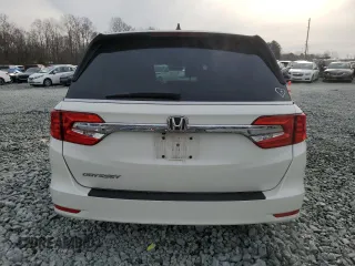 2019 Honda Odyssey EX-L with VIN 5FNRL6H72KB014960, listed as a Copart auction lot 48701035 with 131,921 mi miles and Salvage Title. Bid and sale history available at carsss.com. Image 6.