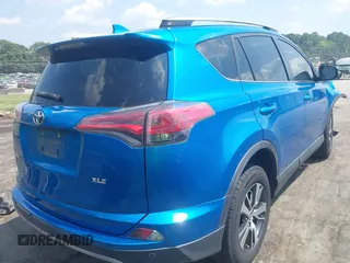 2018 Toyota RAV4 XLE with VIN JTMWFREVXJJ751586, listed as a IAAI auction lot 42586337 with 55,821 mi miles and . Bid and sale history available at DreamBid. Image 4.