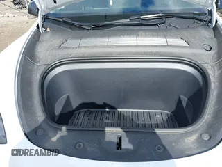 2023 Tesla Model Y Long Range with VIN 7SAYGDEE7PF832007, listed as a IAAI auction lot 41751598 with 14,126 mi miles and . Bid and sale history available at DreamBid. Image 10.