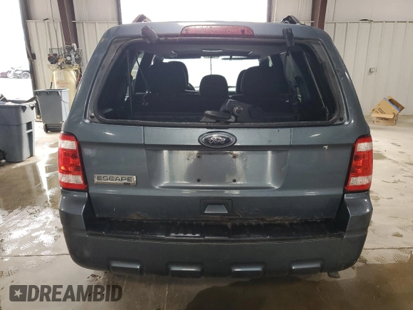 2012 Ford Escape XLT z VIN 1FMCU9D75CKA05373, wystawiony jako Copart lot #63442495 z przebiegiem 117 756 mil mil oraz Szkoda całkowita • Salvage title. Historia ofert i sprzedaży dostępna na DreamBid. Obrazek 6.