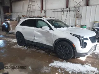 2023 Cadillac XT4 AWD Sport with VIN 1GYFZFR42PF111269, listed as a IAAI auction lot 41614455 with 21,866 mi miles. Bid and sale history available at carsss.com. Image 1.
