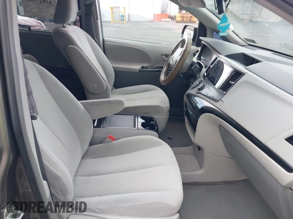 2013 Toyota Sienna LE with VIN 5TDJK3DC1DS049621, listed as a IAAI auction lot 42027930 with 206,148 mi miles and . Bid and sale history available at DreamBid. Image 5.