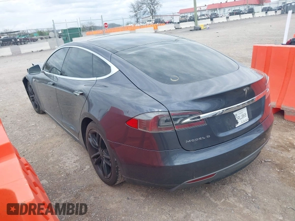 2016 Tesla Model S 90D with VIN 5YJSA1E27GF129130, listed as a IAAI auction lot 41922227 with 134,422 mi miles and . Bid and sale history available at DreamBid. Image 3.