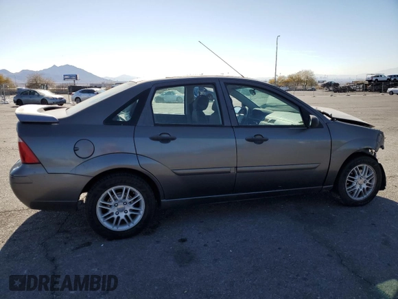 2007 Ford Focus S z VIN 1FAFP34NX7W321313, wystawiony jako Copart lot #43158235 z przebiegiem 57 299 mil mil oraz Szkoda całkowita • Salvage title. Historia ofert i sprzedaży dostępna na DreamBid. Obrazek 3.