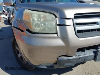 2006 Honda Pilot EX with VIN 5FNYF28416B017534, listed as a IAAI auction lot 41656789 with 241,343 mi miles and . Bid and sale history available at DreamBid. Image 19.
