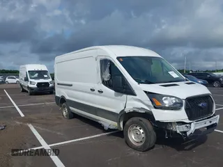 2022 Ford Transit Cargo z VIN 1FTBR1C83NKA81478, wystawiony jako IAAI lot #42491735 z przebiegiem 12 902 mil mil oraz . Historia ofert i sprzedaży dostępna na DreamBid. Obrazek 1.