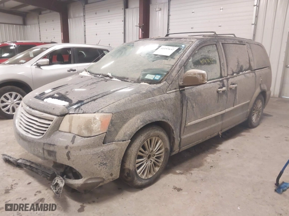 2013 Chrysler Town & Country Touring-L with VIN 2C4RC1CGXDR677260, listed as a IAAI auction lot 41197632 with 159,334 mi miles. Bid and sale history available at carsss.com. Image 17.