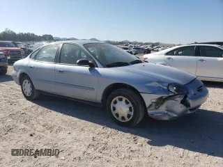 1998 Ford Taurus LX z VIN 1FAFP52U5WA273382, wystawiony jako Copart lot #77102854 z przebiegiem 73 014 mil mil oraz Szkoda całkowita • Salvage title. Historia ofert i sprzedaży dostępna na DreamBid. Obrazek 4.