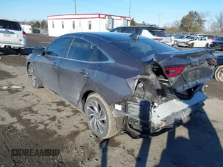 2022 Honda Insight Touring with VIN 19XZE4F99NE008697, listed as a IAAI auction lot 41381095 with 59,310 mi miles and . Bid and sale history available at DreamBid. Image 3.