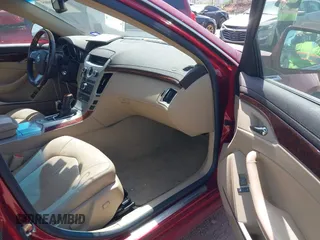 2008 Cadillac CTS RWD w/1SB with VIN 1G6DV57V980213836, listed as a IAAI auction lot 42006005 with 124,596 mi miles. Bid and sale history available at carsss.com. Image 5.
