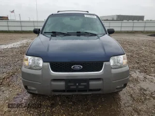 2002 Ford Escape XLT Choice with VIN 1FMYU04182KD34094, listed as a Copart auction lot 57299225 with 154,784 mi miles and Salvage title. Bid and sale history available at DreamBid. Image 5.