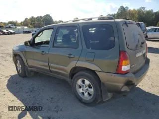 2002 Mazda Tribute LX with VIN 4F2YU09122KM62196, listed as a Copart auction lot 77327034 with 256,385 mi miles and Salvage Title. Bid and sale history available at carsss.com. Image 2.