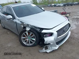 2015 Infiniti Q50 Premium z VIN JN1BV7AR8FM390785, wystawiony jako IAAI lot #42200437 z przebiegiem 94 841 mil mil oraz . Historia ofert i sprzedaży dostępna na DreamBid. Obrazek 6.