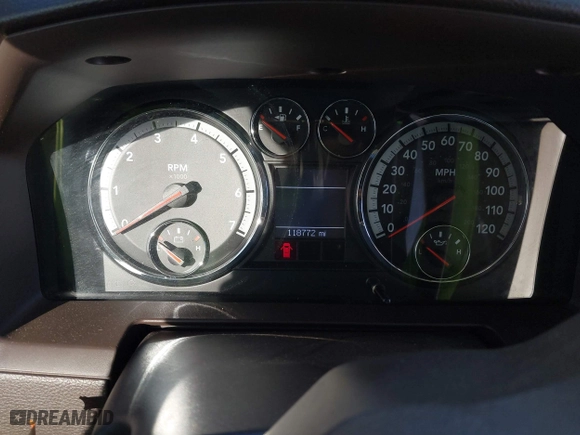 2009 Dodge Ram 1500 Sport with VIN 1D3HB13T99S772935, listed as a IAAI auction lot 41006604 with 118,772 mi miles. Bid and sale history available at carsss.com. Image 7.