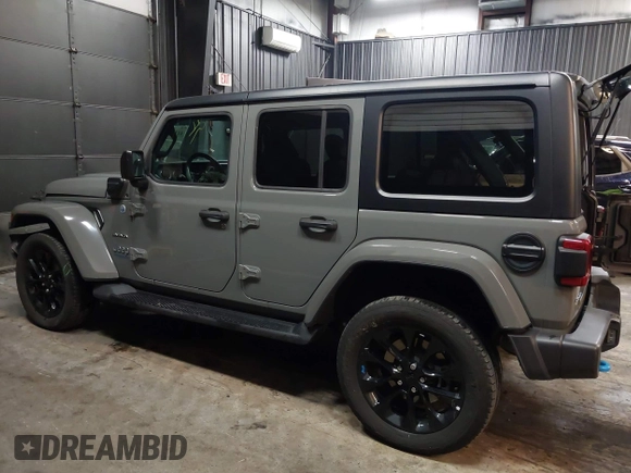 2022 Jeep Wrangler Unlimited Sahara with VIN 1C4JJXP66NW198723, listed as a IAAI auction lot 41368728 with 31,814 mi miles and . Bid and sale history available at DreamBid. Image 3.