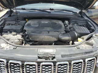 2018 Jeep Grand Cherokee Sterling z VIN 1C4RJEBG4JC241944, wystawiony jako Copart lot #61679565 z przebiegiem 83 480 mil mil oraz Szkoda całkowita • Salvage title. Historia ofert i sprzedaży dostępna na DreamBid. Obrazek 11.