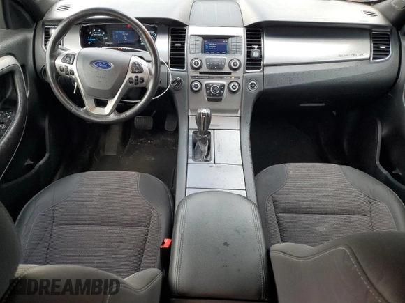 2015 Ford Taurus SEL with VIN 1FAHP2E88FG166961, listed as a Copart auction lot 61429255 with 124,780 mi miles and Salvage title. Bid and sale history available at DreamBid. Image 8.