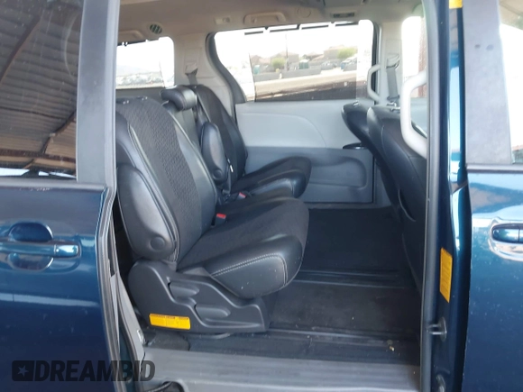 2012 Toyota Sienna SE with VIN 5TDXK3DC0CS264643, listed as a IAAI auction lot 42004082 with 118,675 mi miles. Bid and sale history available at carsss.com. Image 8.