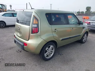 2011 Kia Soul + with VIN KNDJT2A2XB7205827, listed as a IAAI auction lot 41889620 with 158,965 mi miles. Bid and sale history available at carsss.com. Image 4.