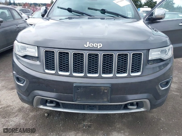 2014 Jeep Grand Cherokee Overland with VIN 1C4RJFCM7EC427204, listed as a IAAI auction lot 41934698 with 147,131 mi miles. Bid and sale history available at carsss.com. Image 6.