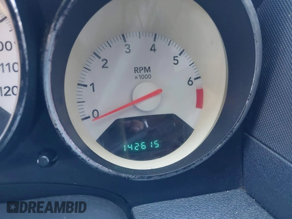 2008 Dodge Caliber SXT with VIN 1B3HB48B48D594124, listed as a IAAI auction lot 40282351 with 142,615 mi miles. Bid and sale history available at carsss.com. Image 7.
