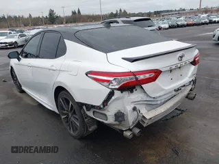 2020 Toyota Camry XSE with VIN 4T1K61AK7LU374885, listed as a IAAI auction lot 41579252 with 85,750 mi miles and . Bid and sale history available at DreamBid. Image 3.