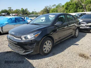 2023 Kia Rio S with VIN 3KPA24AD0PE565857, listed as a Copart auction lot 51256655 with 33,272 mi miles and Salvage Title. Bid and sale history available at carsss.com. Image 1.