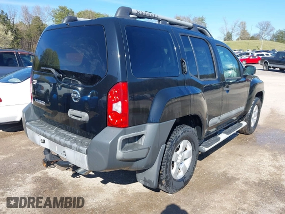 2012 Nissan Xterra S with VIN 5N1AN0NW2CC521142, listed as a IAAI auction lot 41858699 with 214,789 mi miles and . Bid and sale history available at DreamBid. Image 4.