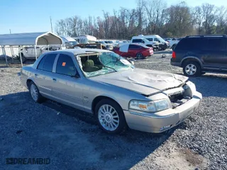 2010 Mercury Grand Marquis LS with VIN 2MEBM7FV2AX635506, listed as a IAAI auction lot 41597727 with NaN miles. Bid and sale history available at carsss.com. Image 1.