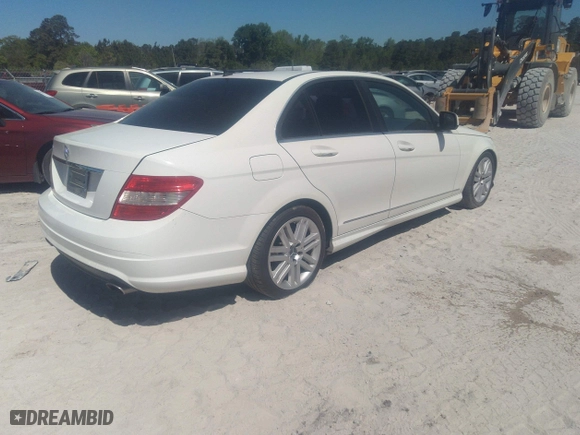 2009 Mercedes-Benz C-Class 3.0L Sport with VIN WDDGF54X59R056788, listed as a IAAI auction lot 42050204 with 213,706 mi miles. Bid and sale history available at carsss.com. Image 4.