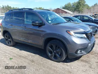 2021 Honda Passport Elite with VIN 5FNYF8H08MB011467, listed as a IAAI auction lot 41929708 with 34,106 mi miles. Bid and sale history available at carsss.com. Image 1.