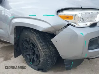 2021 Toyota Tacoma SR with VIN 5TFAX5GN7MX192500, listed as a IAAI auction lot 41674939 with 33,608 mi miles and . Bid and sale history available at DreamBid. Image 6.