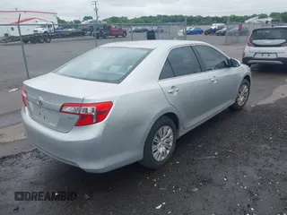 2012 Toyota Camry L z VIN 4T4BF1FK0CR157600, wystawiony jako IAAI lot #42438078 z przebiegiem 94 310 mil mil oraz . Historia ofert i sprzedaży dostępna na DreamBid. Obrazek 4.