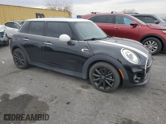 2017 MINI Hardtop 4 Door Cooper with VIN WMWXU1C30H2E19304, listed as a Copart auction lot 51008575 with 34,526 mi miles and Salvage Title. Bid and sale history available at DreamBid. Image 4.