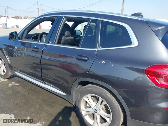 2021 BMW X3 sDrive30i with VIN 5UXTY3C08M9G12128, listed as a IAAI auction lot 41562192 with 33,977 mi miles. Bid and sale history available at carsss.com. Image 6.