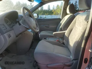 2010 Toyota Sienna with VIN 5TDZK4CCXAS335182, listed as a Copart auction lot 73518054 with 180,248 mi miles and Clean Title. Bid and sale history available at DreamBid. Image 7.