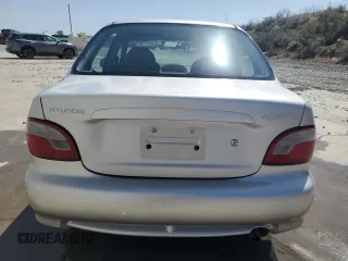 1998 Hyundai Accent z VIN KMHVF24N8WU500040, wystawiony jako Copart lot #52039755 z przebiegiem 103 631 mil mil oraz Szkody całkowita. Historia ofert i sprzedaży dostępna na DreamBid. Obrazek 6.