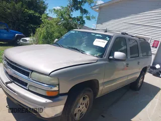 2004 Chevrolet Suburban LT z VIN 1GNFK16Z24J154314, wystawiony jako IAAI lot #42462404 z przebiegiem 275 938 mil mil oraz . Historia ofert i sprzedaży dostępna na DreamBid. Obrazek 2.