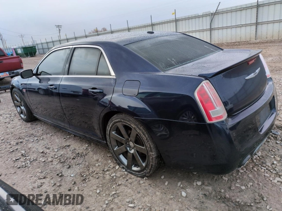 2013 Chrysler 300 SRT-8 z VIN 2C3CCAFJ4DH735421, wystawiony jako Copart lot #50936775 z przebiegiem 113 701 mil mil oraz Szkoda całkowita • Salvage title. Historia ofert i sprzedaży dostępna na DreamBid. Obrazek 2.