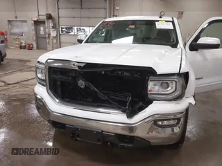 2016 GMC Sierra 1500 SLE z VIN 3GTU2MEC8GG187919, wystawiony jako IAAI lot #41967215 z przebiegiem 74 487 mil mil oraz . Historia ofert i sprzedaży dostępna na DreamBid. Obrazek 6.