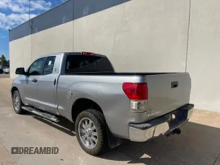 2012 Toyota Tundra z VIN 5TFRM5F10CX040423, wystawiony jako Copart lot #63373535 z przebiegiem 258 090 mil mil oraz Czysty tytuł • Clean title. Historia ofert i sprzedaży dostępna na DreamBid. Obrazek 3.