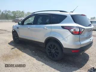 2017 Ford Escape SE z VIN 1FMCU9G95HUD37371, wystawiony jako IAAI lot #42393304 z przebiegiem 76 039 mil mil oraz . Historia ofert i sprzedaży dostępna na DreamBid. Obrazek 3.