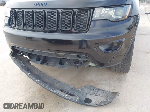 2018 Jeep Grand Cherokee Altitude with VIN 1C4RJFAG9JC436848, listed as a IAAI auction lot 42303459 with 124,044 mi miles and . Bid and sale history available at DreamBid. Image 6.